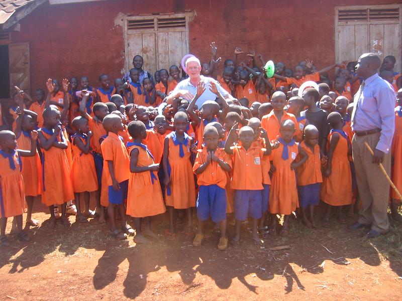 Dr. Norman with Ugandian Children